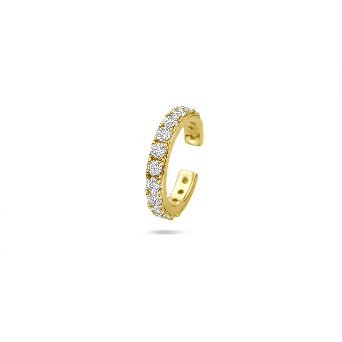 Ear cuff dorado de plata con circonitas brillantes, diseño abierto y forma curva.
