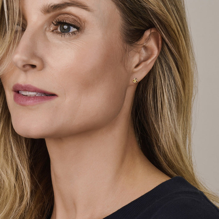 9k Geelgouden oorknoppen met knoop