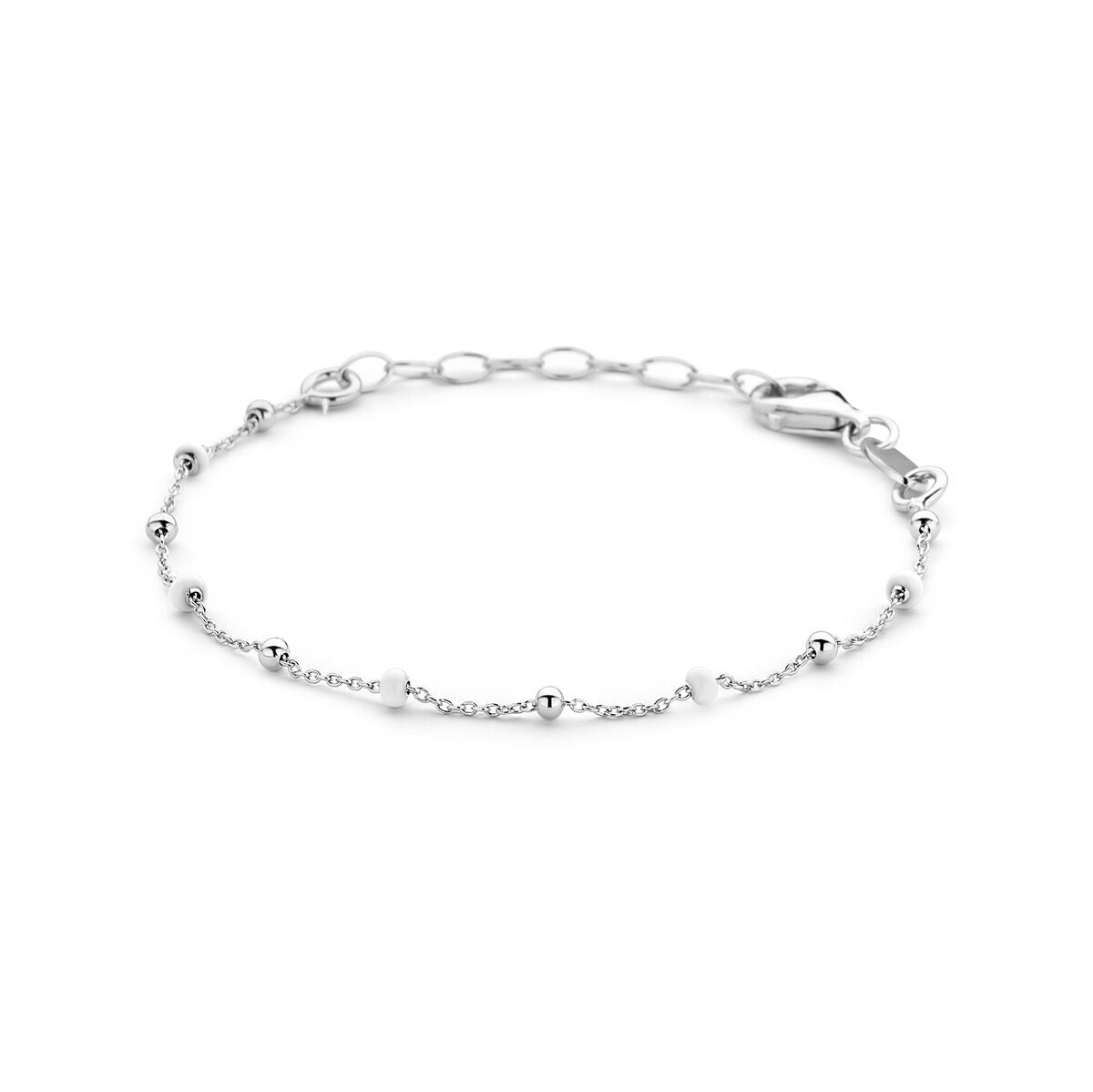 Pulsera infantil de plata rodiada con bolitas de esmalte blanco.