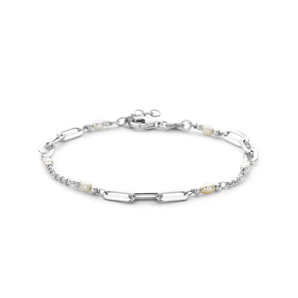Pulsera de plata rodiada con perlas de agua dulce y eslabones alargados.