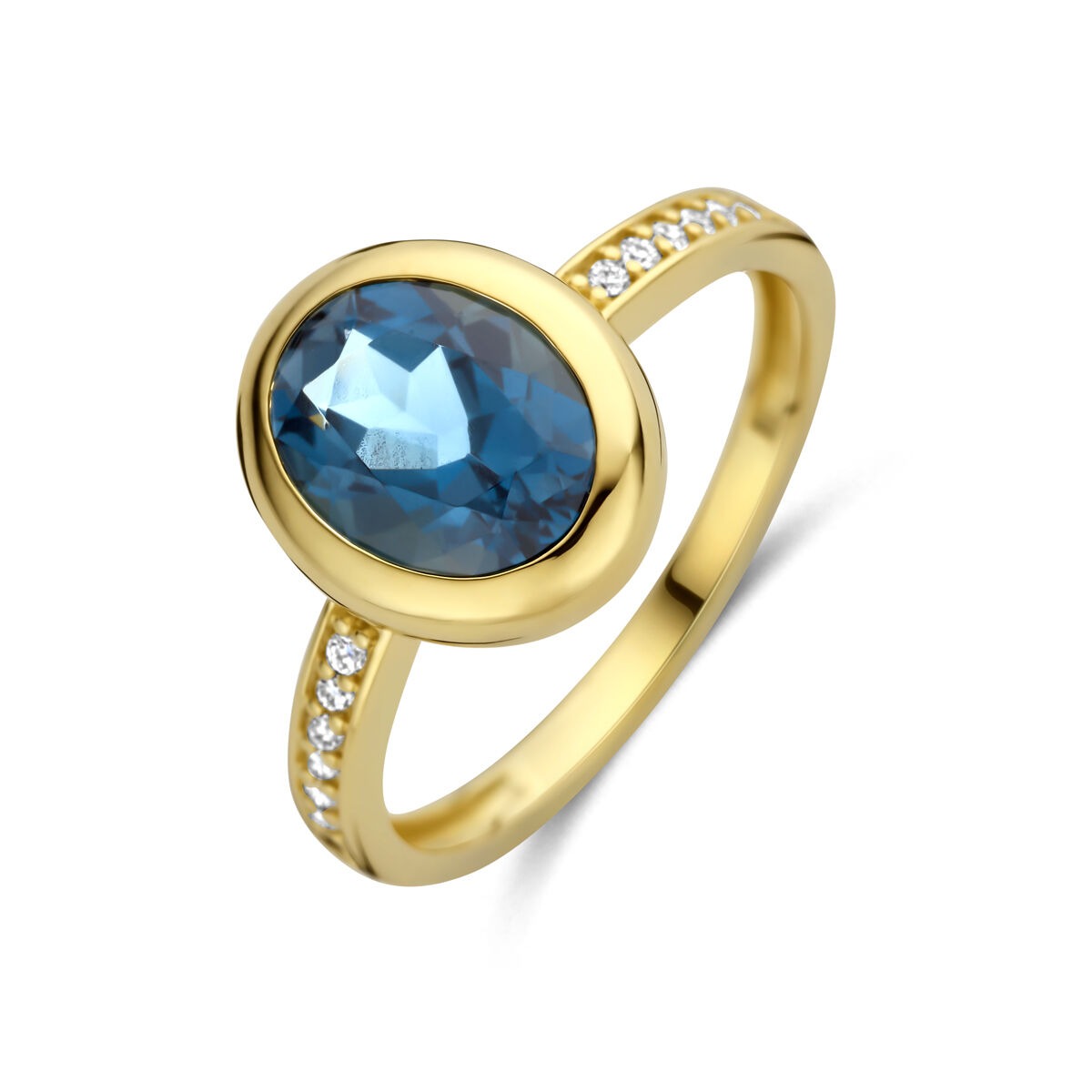 Anillo de dama en oro amarillo de 14k con topacio London Blue ovalado y diamantes.