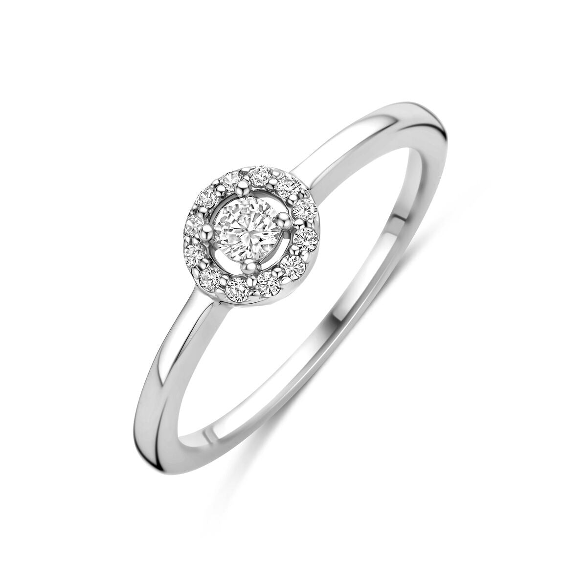 Anillo de plata rodiada con zirconia, diseño solitario y detalle circular en el centro.