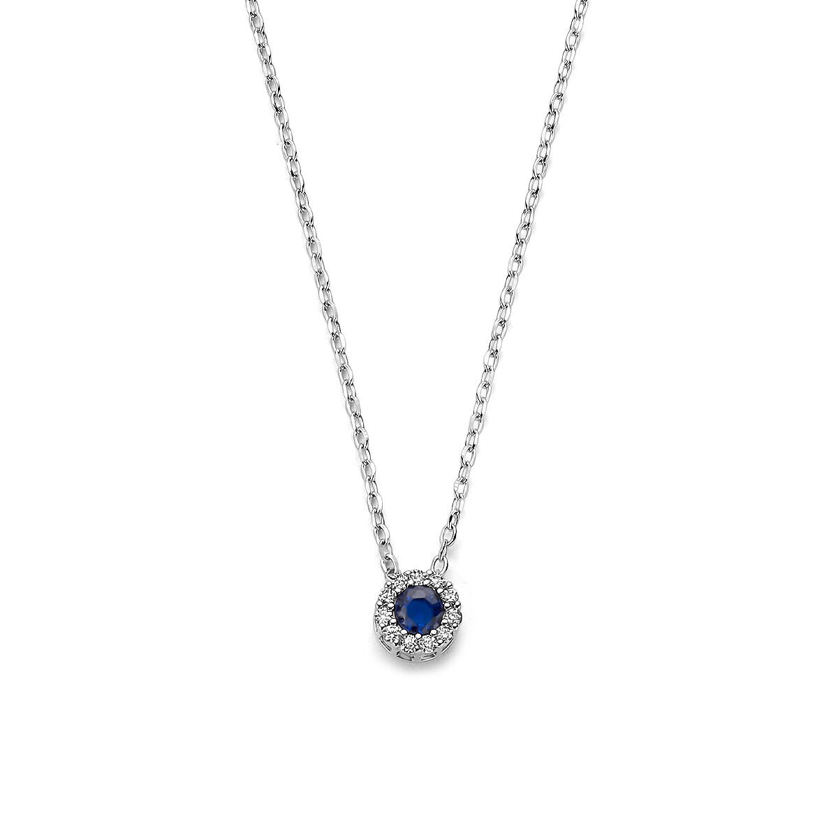 Collar de plata rodiada con un zafiro central rodeado de circonitas brillantes.