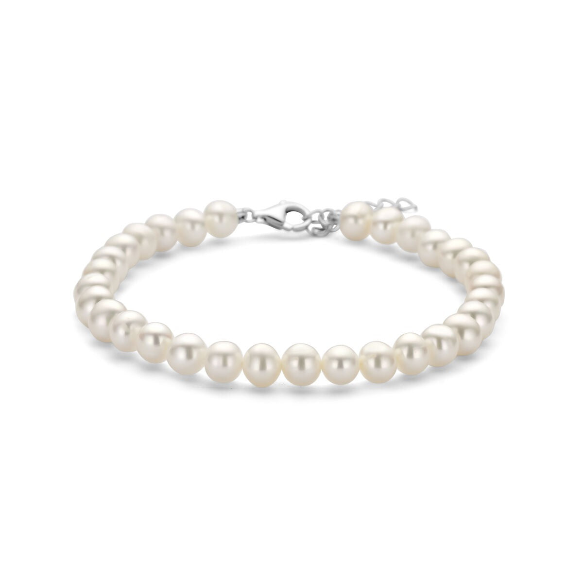 Pulsera de plata rodiada con perlas blancas, diseño clásico y elegante.