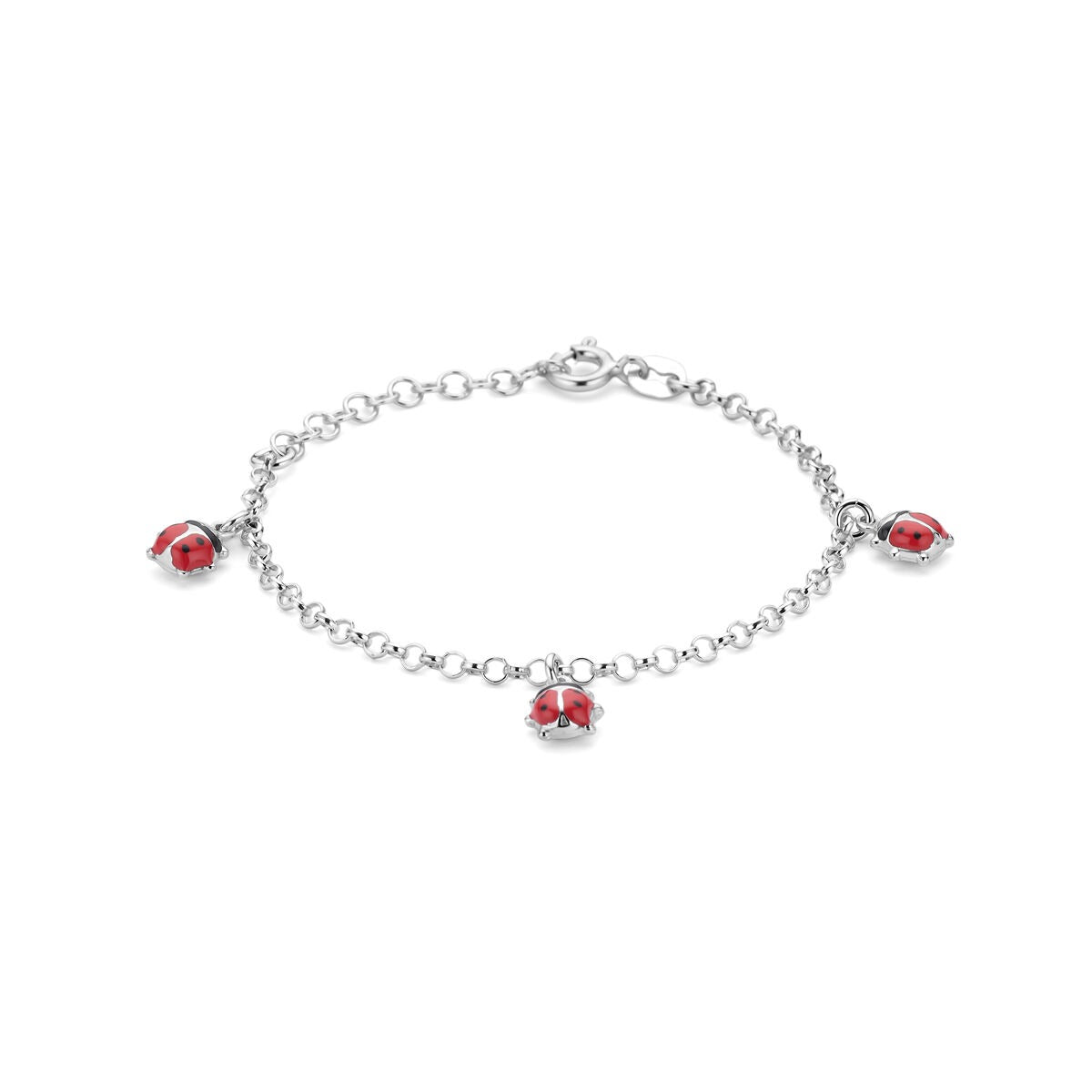 Pulsera infantil de plata con charms de mariquitas rojas, acabada en rodio.