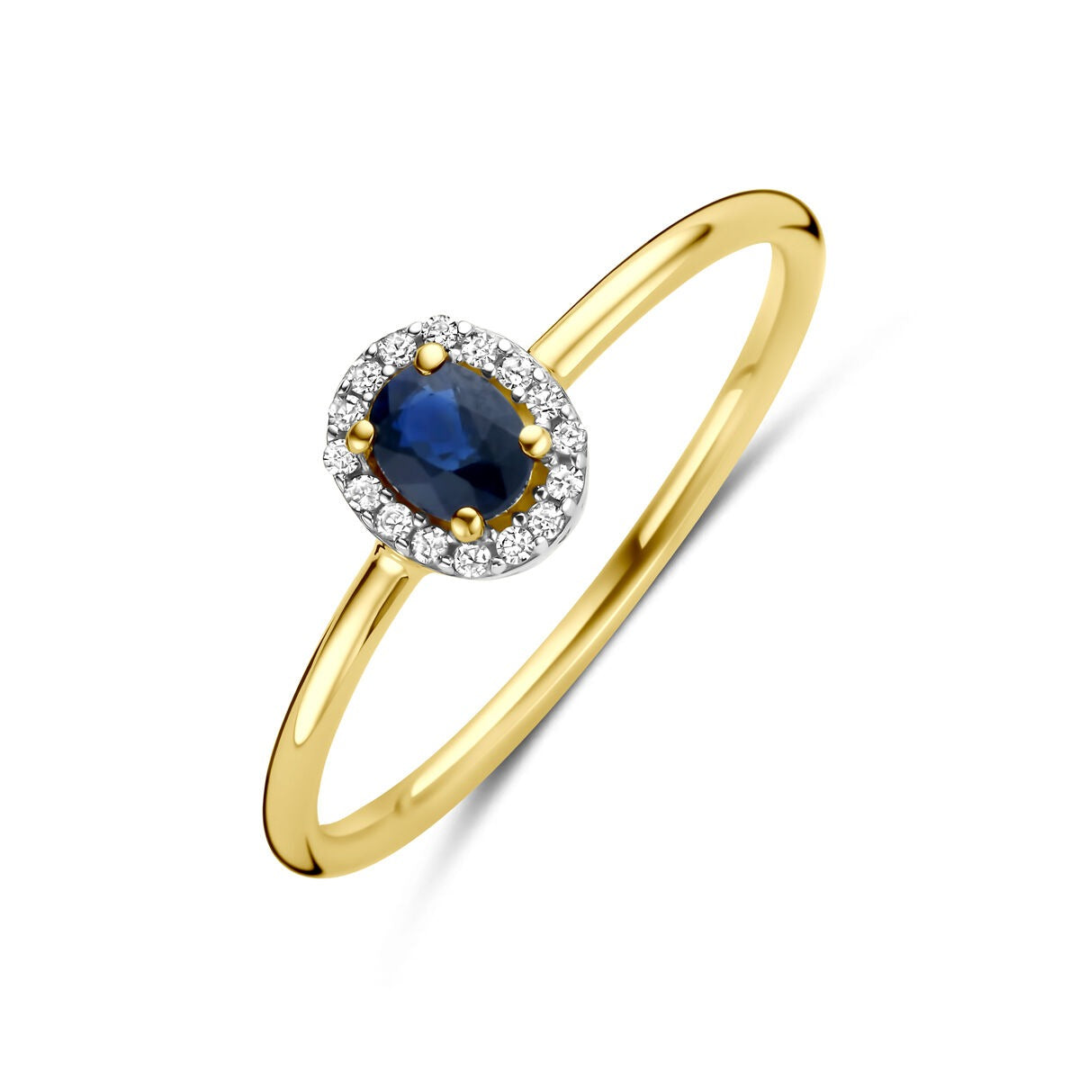 Anillo dorado de 14k con zafiro ovalado y diamantes alrededor.
