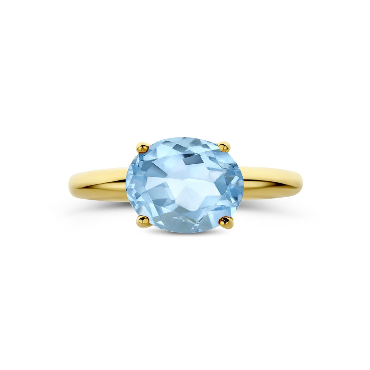 Anillo de oro amarillo de 14k con topacio azul