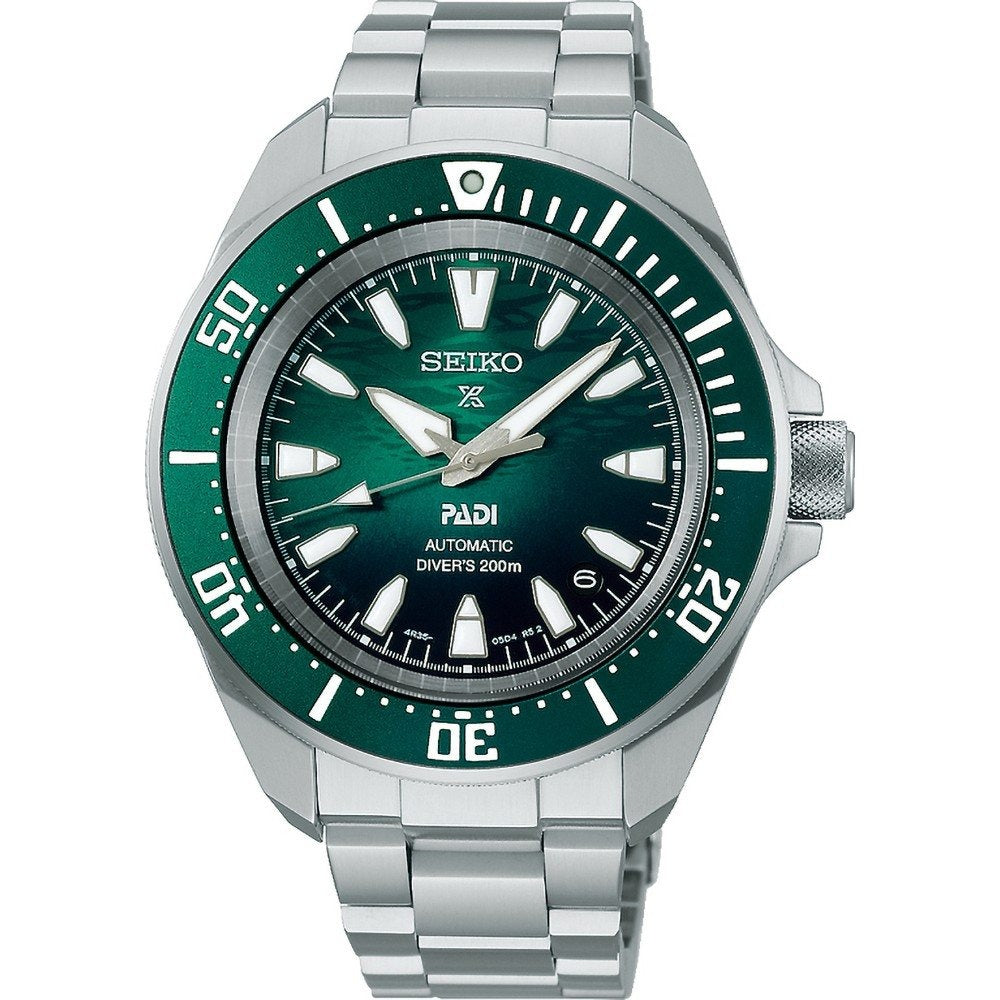 Reloj de hombre Seiko con esfera verde, bisel verde y correa de acero inoxidable.