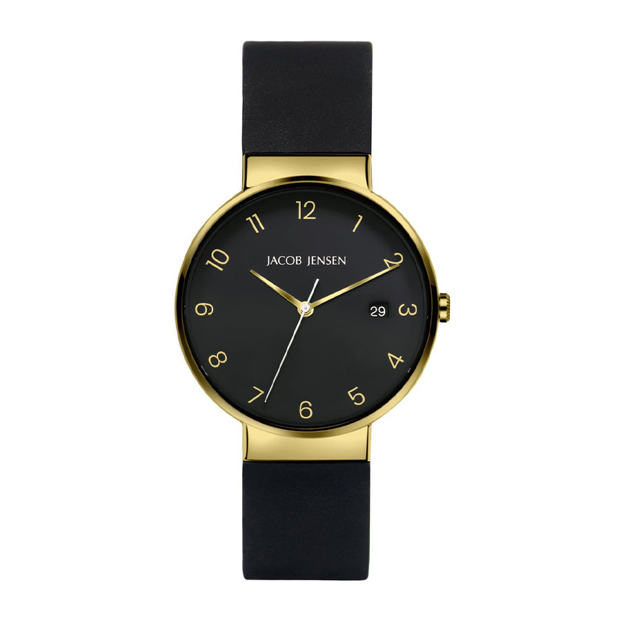 Reloj con esfera negra, caja dorada y correa de silicona negra.
