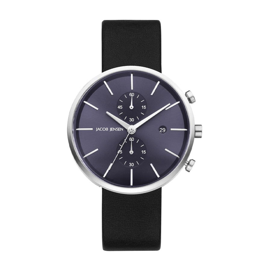 Reloj de esfera negra con correa de silicona negra y detalles plateados.