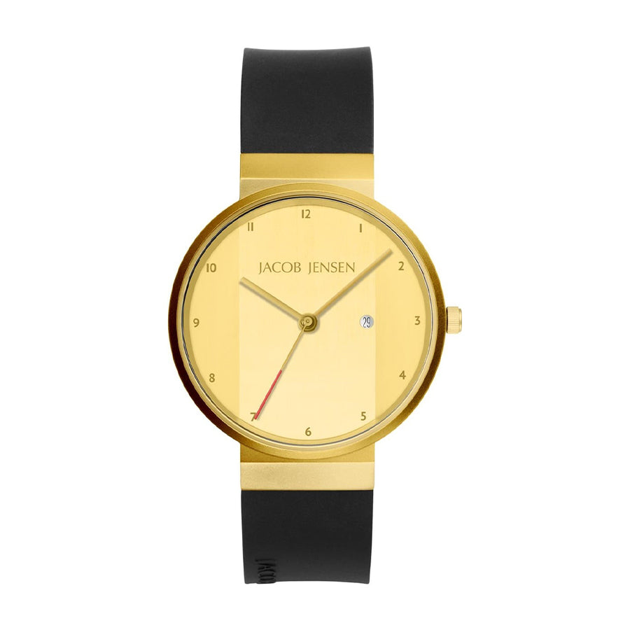 Reloj con esfera dorada, correa de silicona negra y detalles minimalistas.
