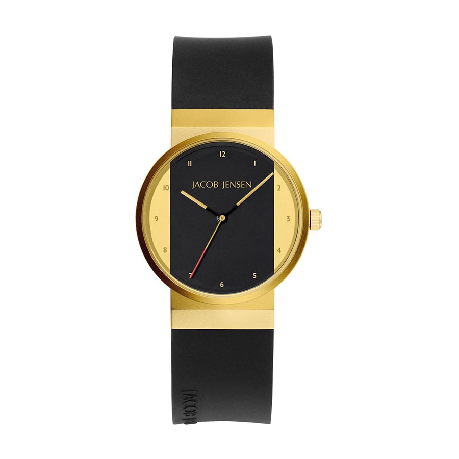 Reloj de esfera negra con caja dorada y correa de silicona negra.