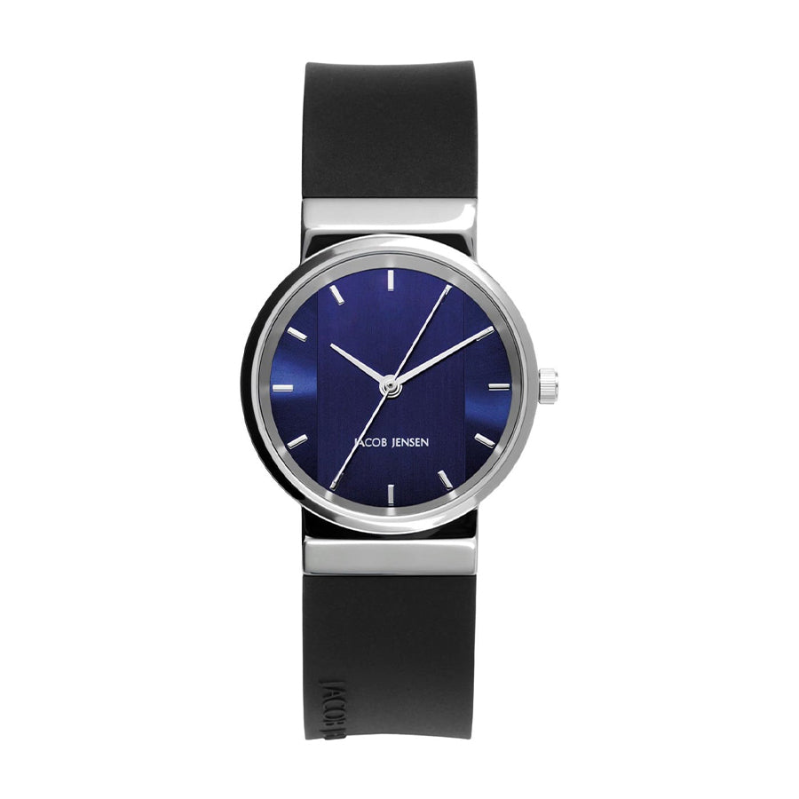 Reloj con esfera azul y correa de silicona negra, caja de acero inoxidable y manecillas plateadas.