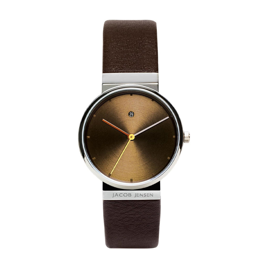 Reloj con esfera marrón, correa de cuero marrón y detalles en amarillo y naranja.