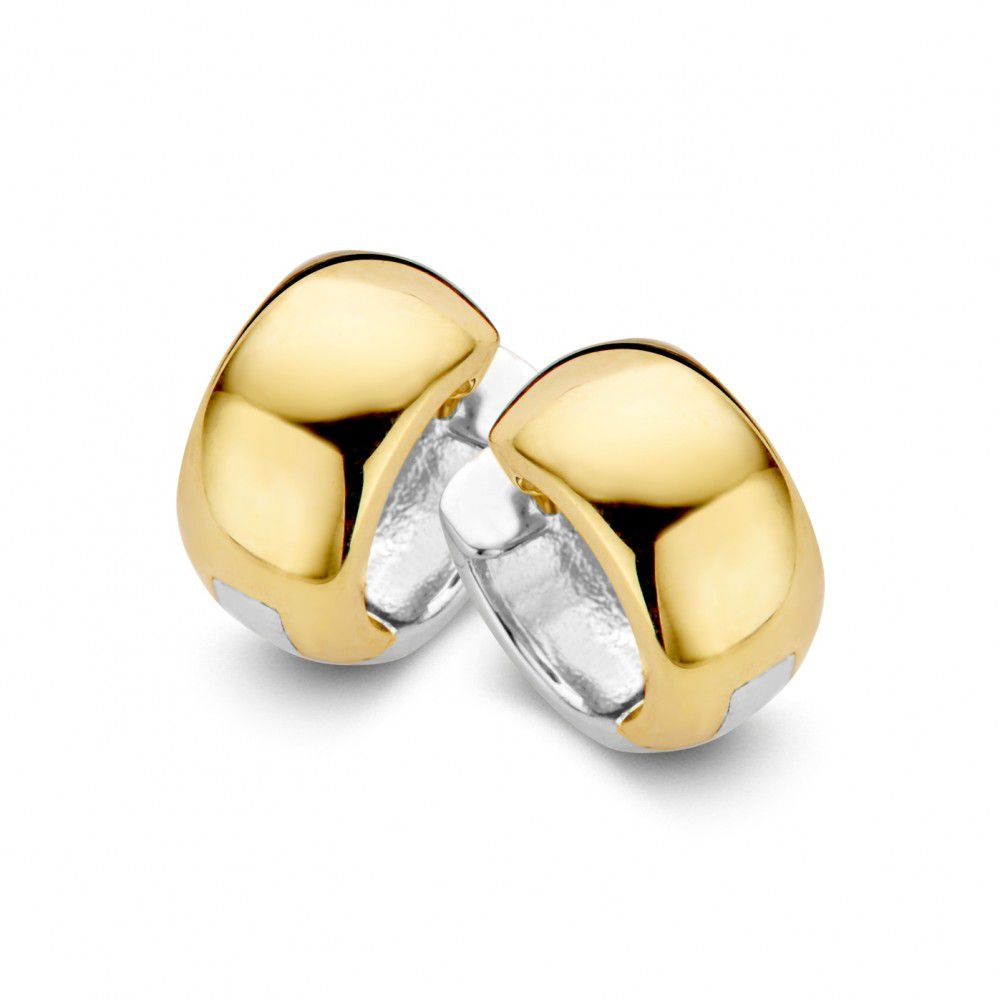 Pendientes de aro bicolores en oro blanco y amarillo, con un diseño pulido y moderno.