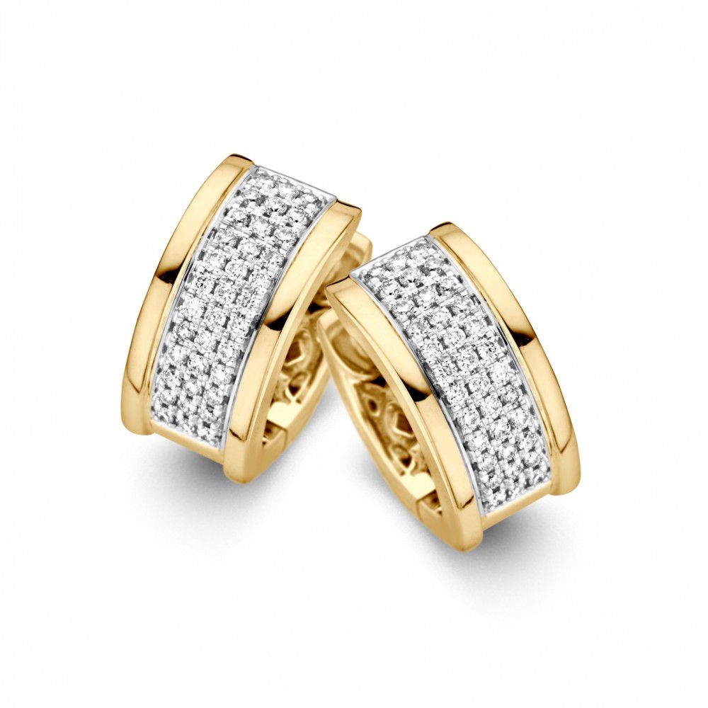 Aros anchos de oro amarillo y blanco con diamantes en pavé, 14 quilates y 0.45 quilates de brillantes.