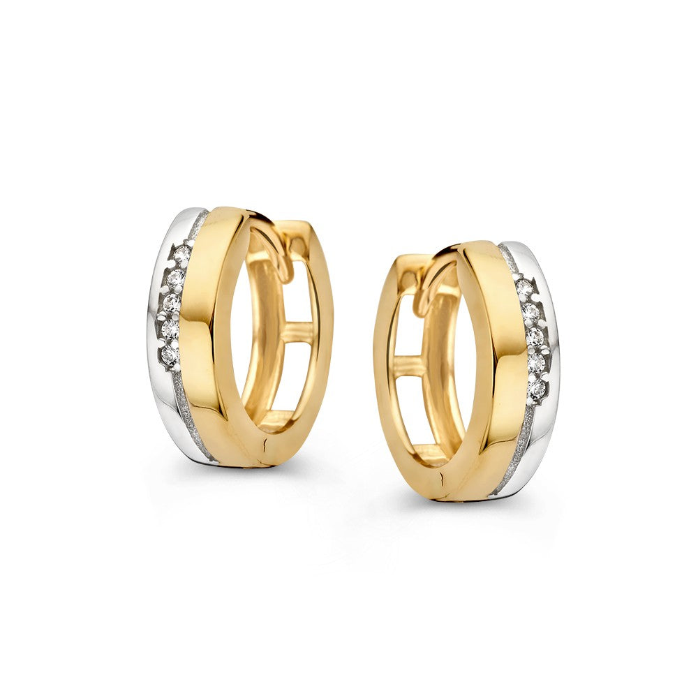 Aros bicolor de oro blanco y amarillo con cinco circonitas, diseño elegante y moderno.