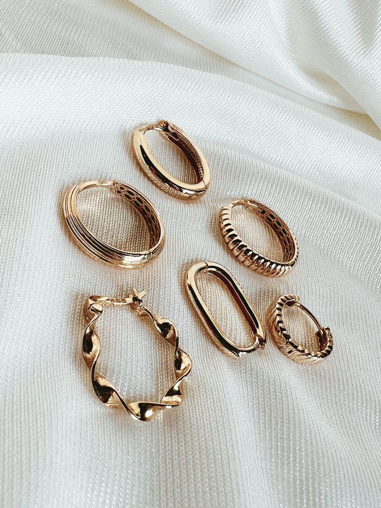Aros de oro amarillo modelo ovalado – 14 quilates de oro | Van der Kooij