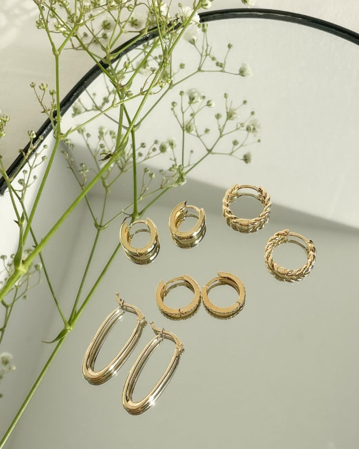 Geelgouden Oorringen met Gedraaid Design – Van der Kooij Elegante Oorbellen