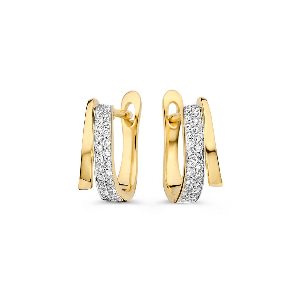 Aros de oro amarillo con brillantes de 0,18 crt en un diseño moderno y elegante.