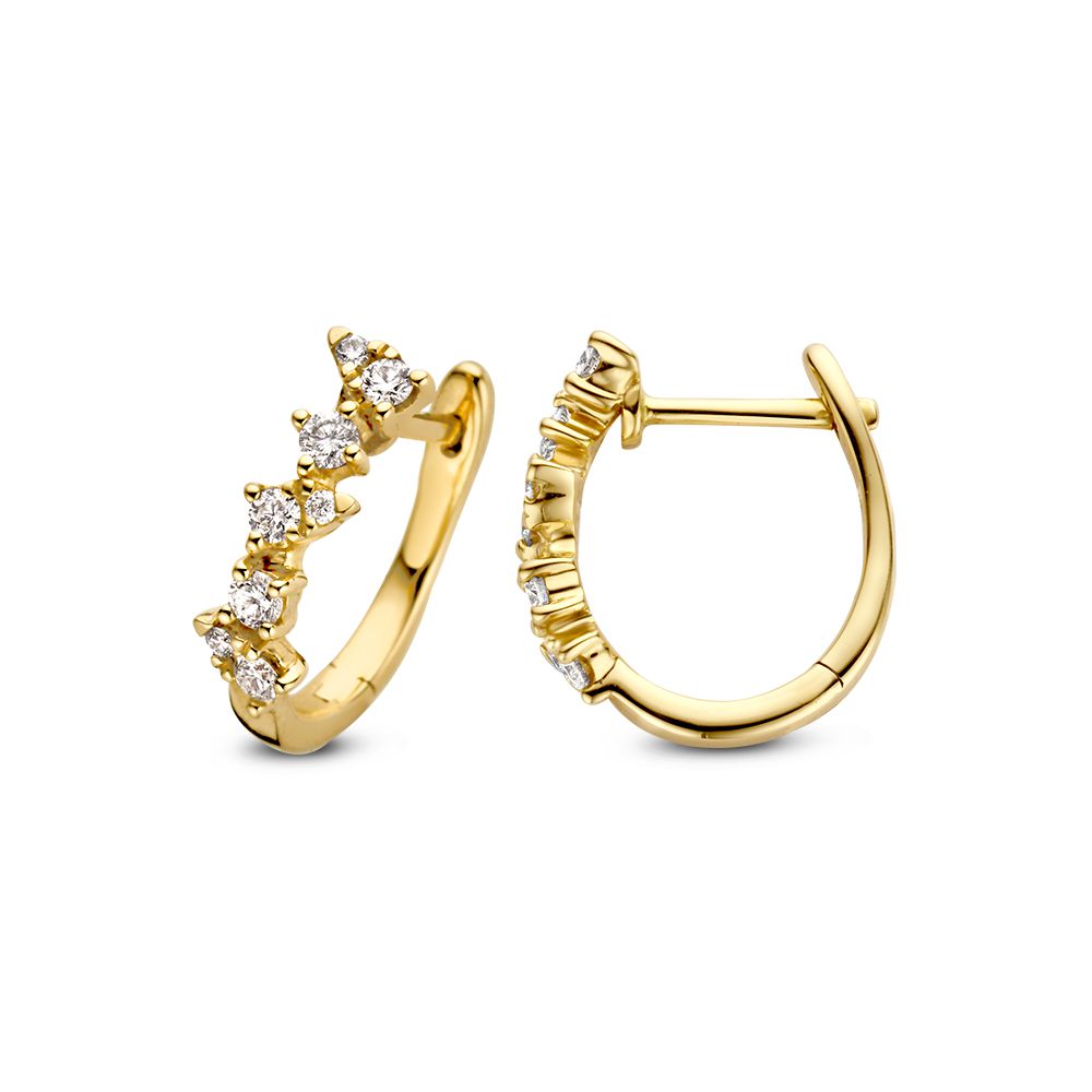 Aros de oro amarillo con diamante: elegancia refinada y lujo deslumbrante 0,32 crt.