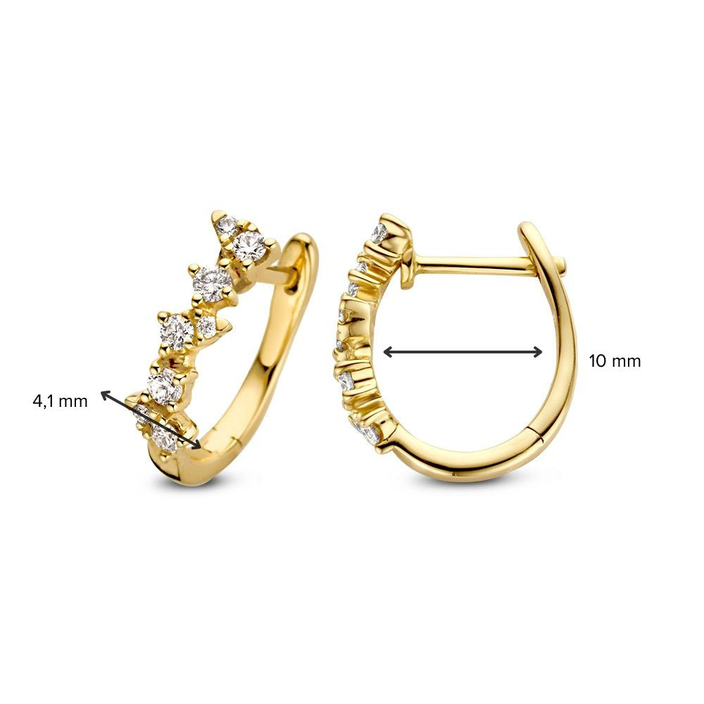 Aros de oro amarillo con diamante: elegancia refinada y lujo deslumbrante 0,32 crt.