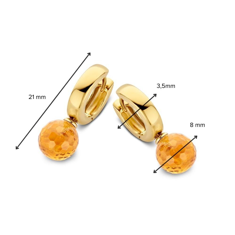 Aros de oro amarillo brillantes con colgantes de citrino