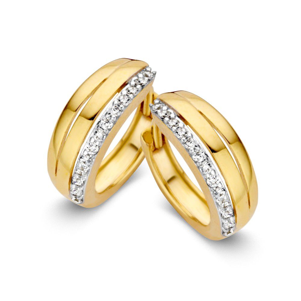 Aros de oro amarillo con detalles en circonitas brillantes.
