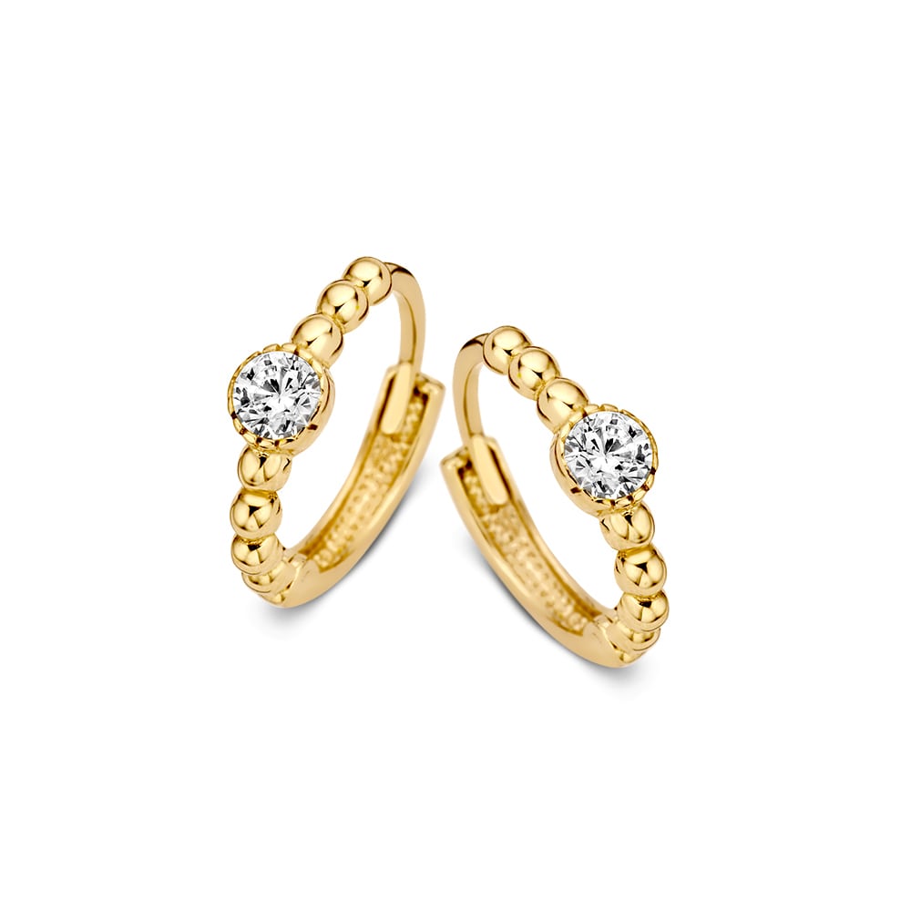 Aros de oro amarillo con bolitas doradas y circonitas, diseño sutil y elegante.
