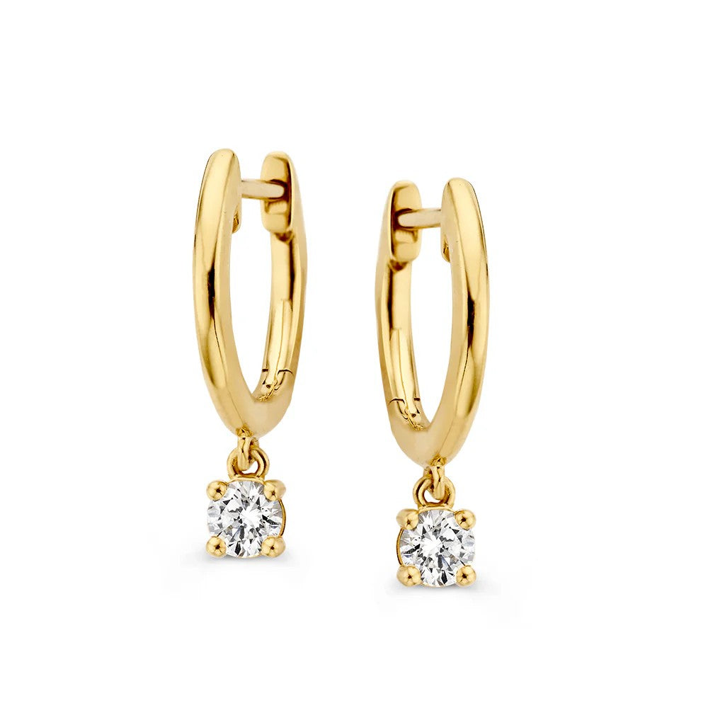 Aros de oro amarillo con un brillante colgante de 0,30 crt.