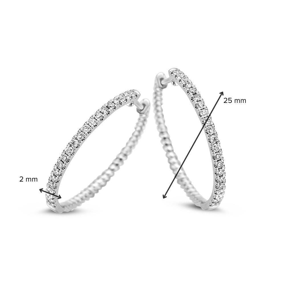 Aros de oro blanco con diamante de 0,48 ct – 14 quilates 0,48 ct.