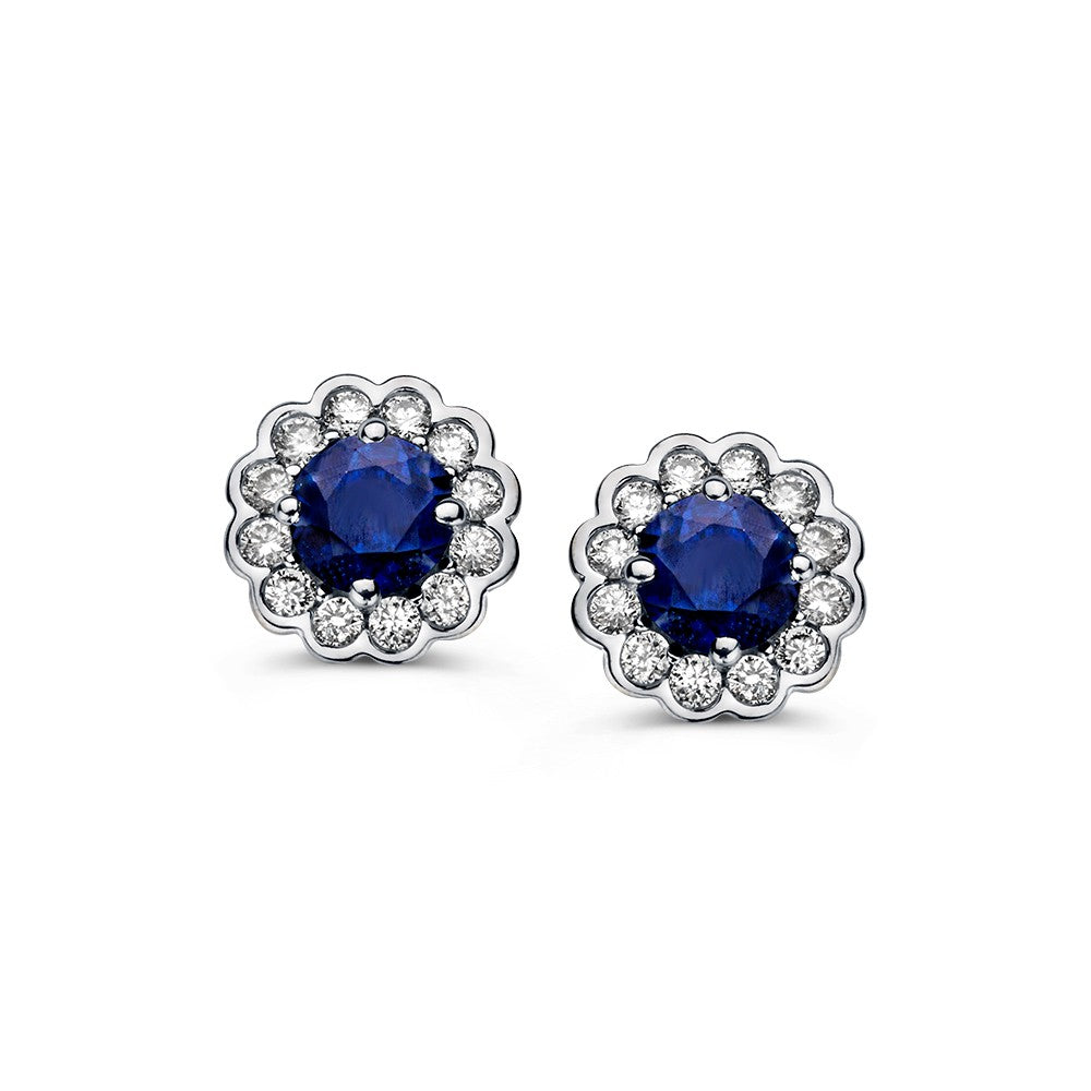 Pendientes de oro amarillo con zafiro y diamantes de 0,66 ct en engaste de entorno.