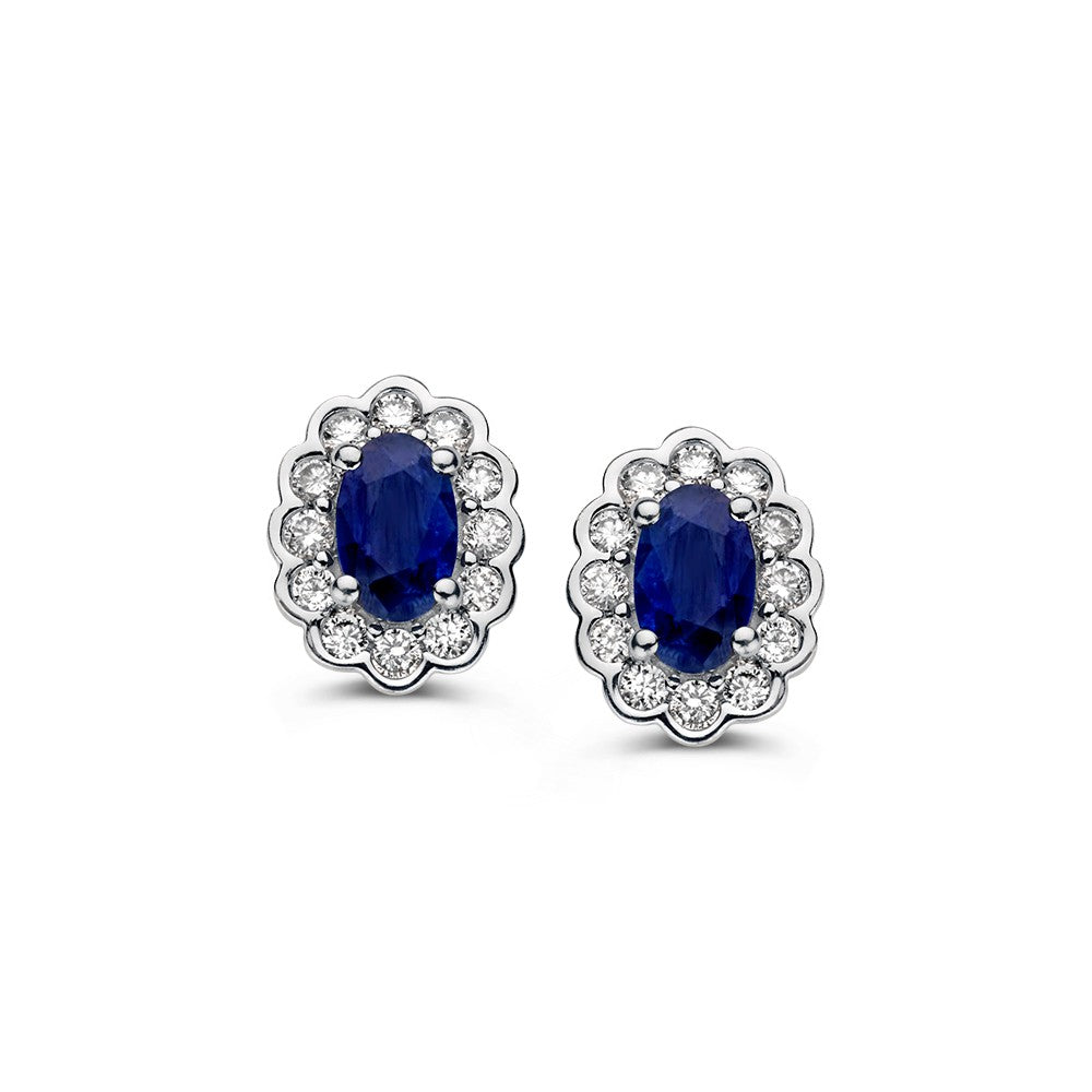 Pendientes de oro amarillo con ópalo ovalado y diamantes de 0,60 ct en engaste de entorno.