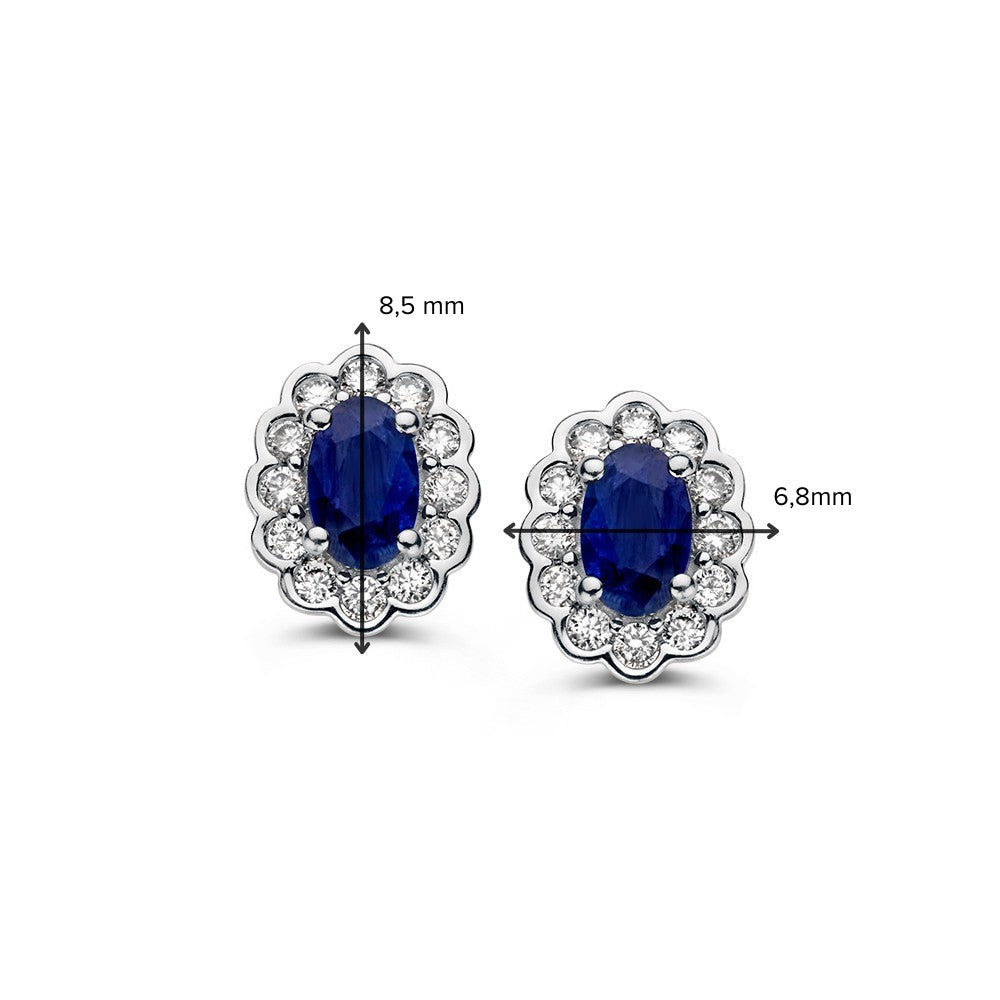Pendientes de oro amarillo con zafiro ovalado y diamante 0,60ct en engaste de entourage
