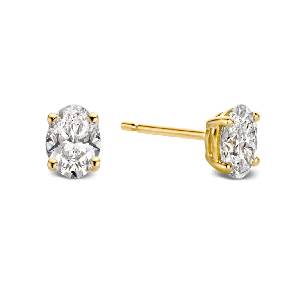 Pendientes de oro amarillo con dos piedras brillantes de 0,50 quilates.
