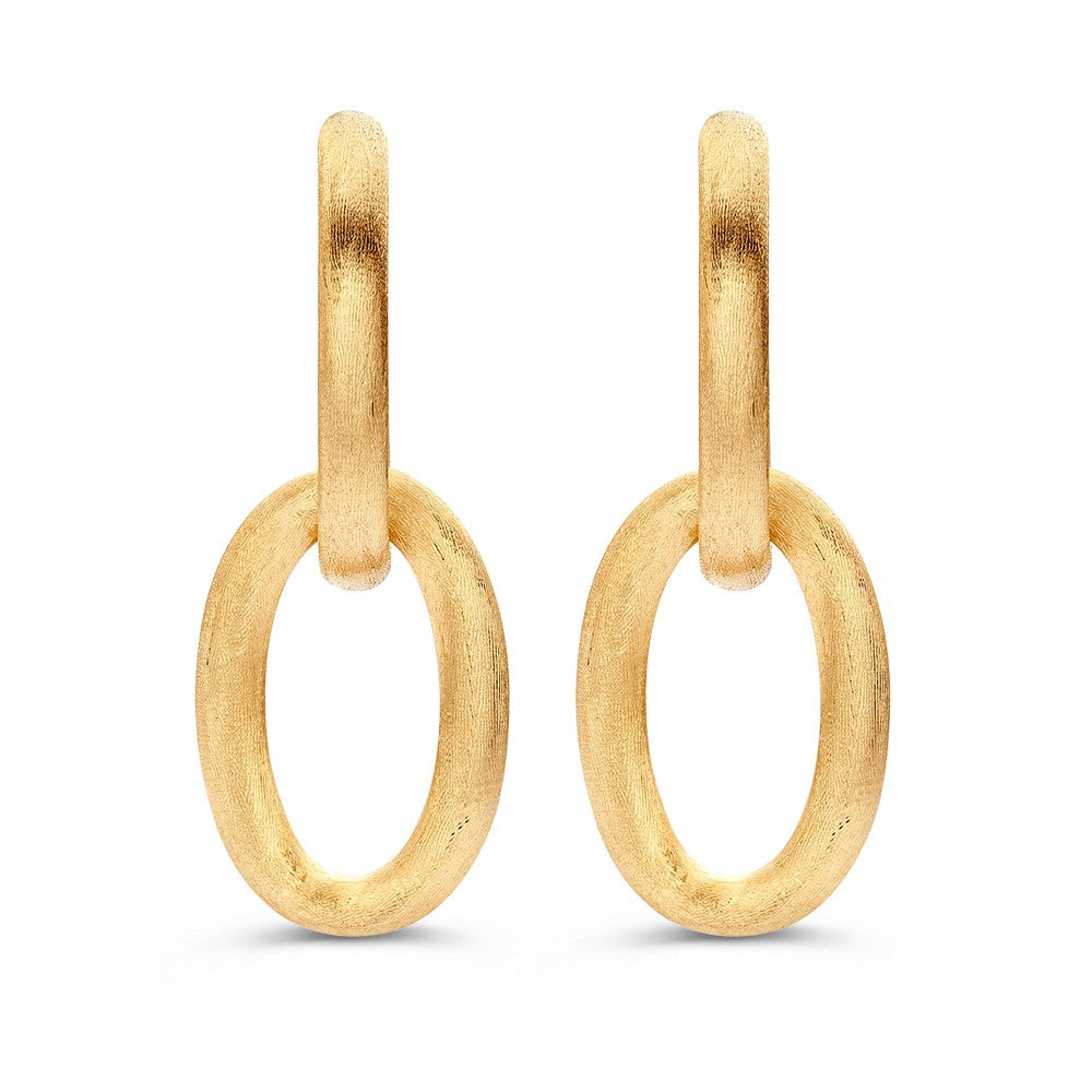 Pendientes de aro grandes en oro amarillo con acabado mate de 14 quilates.