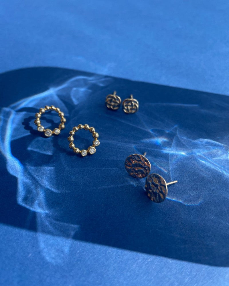 Pendientes de oro amarillo con patrón trenzado – Pendientes elegantes de mujer - Van der Kooij