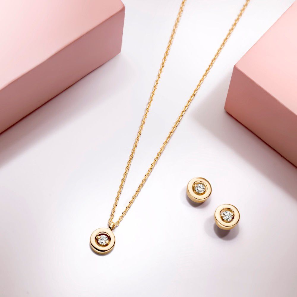 Pendientes de oro amarillo con brillante en engaste ajustado – 14 quilates de oro