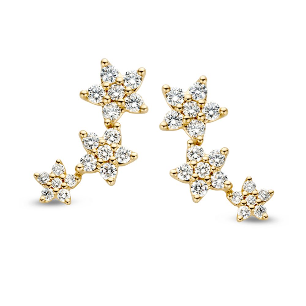 Pendientes largos de oro amarillo con tres estrellas y diamantes de 1,05 crt.