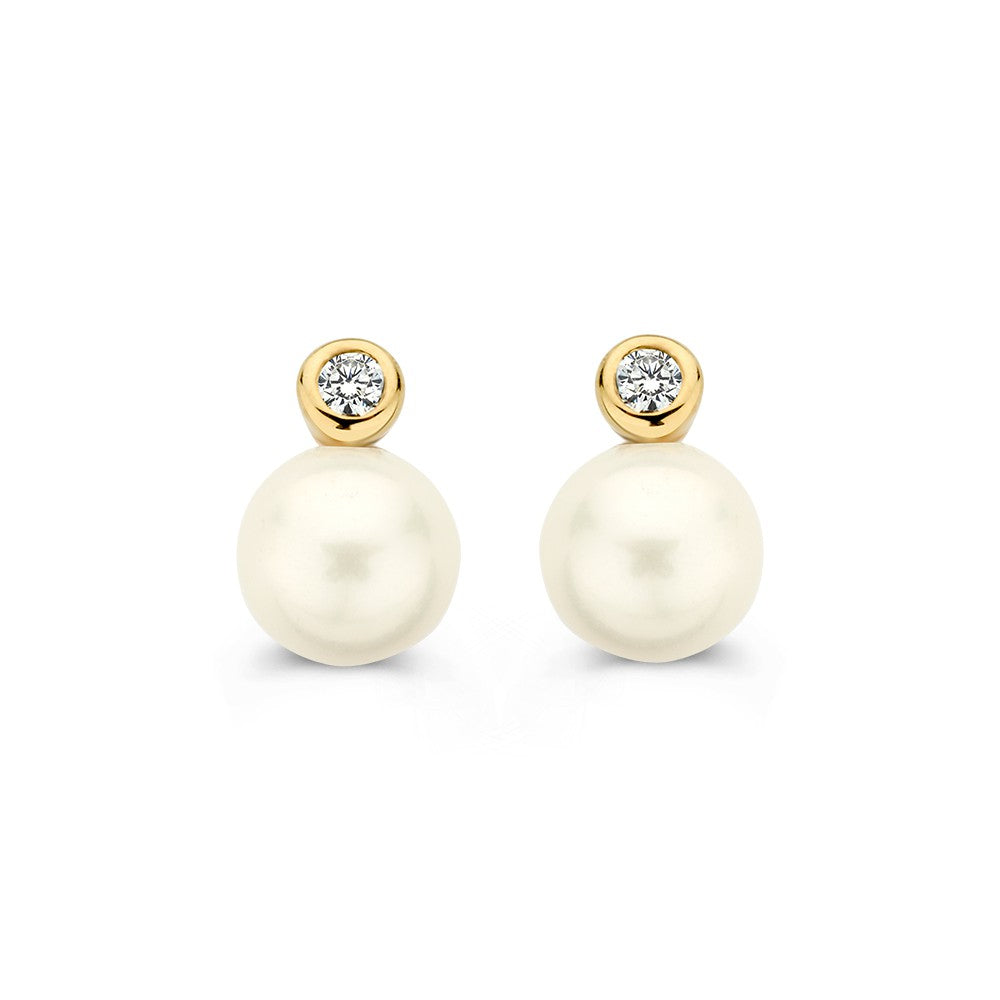 Pendientes de oro de 14 quilates con perla y circonita, de forma redonda y acabado brillante.