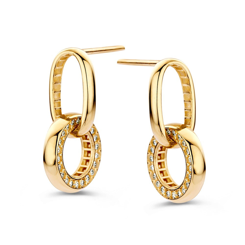 Pendientes de oro amarillo con charms redondos y circonitas, diseño juguetón y lujoso.