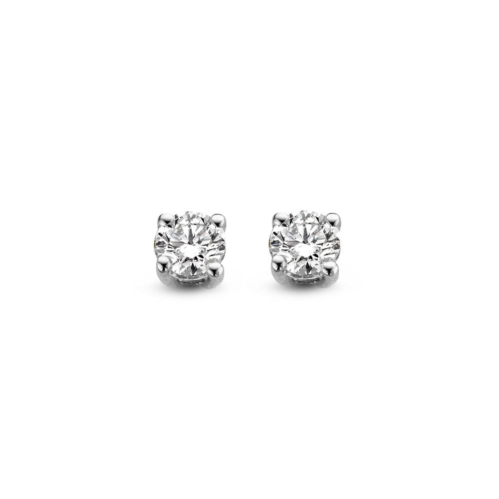 Pendientes de primera puesta de oro blanco con diamantes de 0,20 quilates.