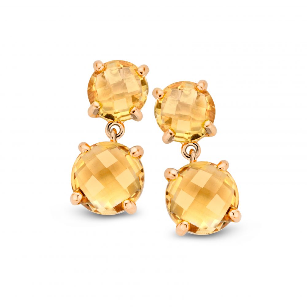 Pendientes de oro amarillo con citrinos, destacando acentos naranjas y diseño de dos piedras.