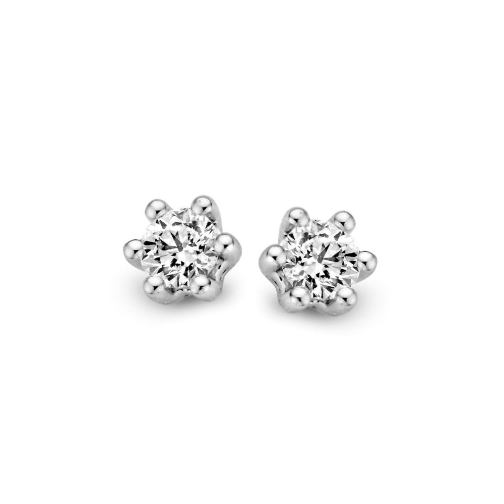 Pendientes de solitario en oro blanco de 14 quilates con diamantes brillantes de 0.20 ct en engaste de seis garras.