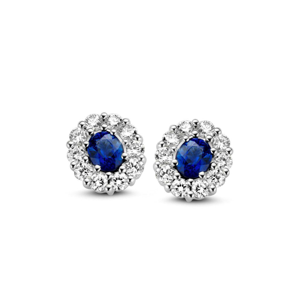 Pendientes de oro blanco con zafiro y diamantes en engaste de entorno, 14 quilates, 0.50 ct.