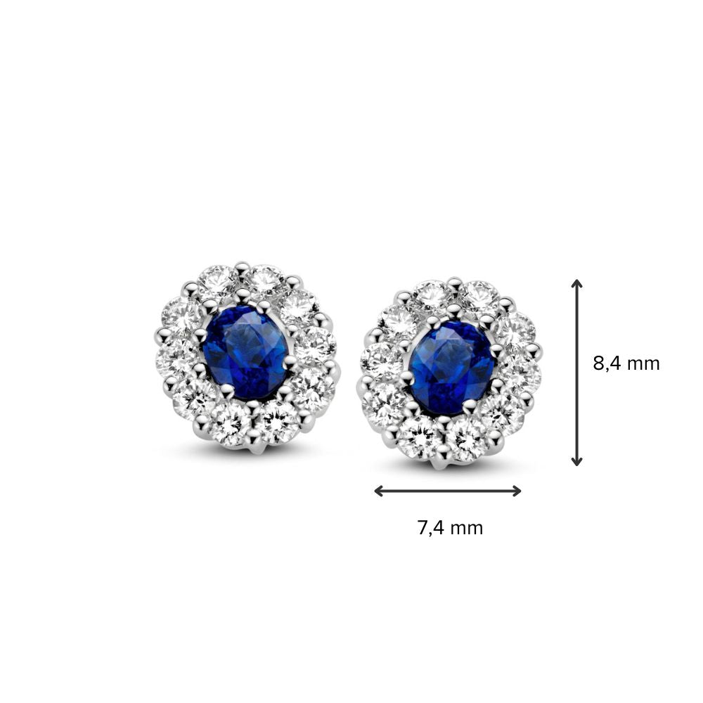 Aros de oro blanco con zafiro y brillante en engaste de entorno – 14 quilates, 0.50 ct