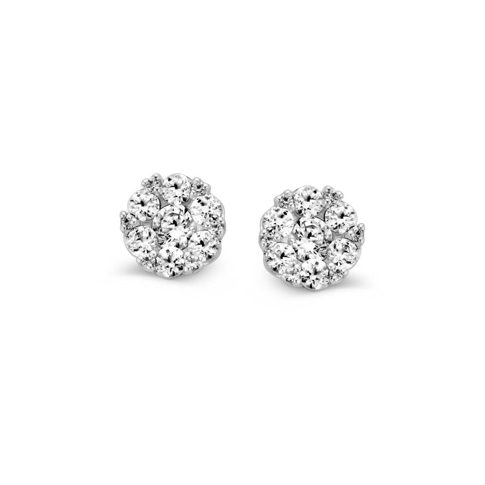 Pendientes de oro blanco con circonitas en engaste clásico, diámetro de 6 mm.