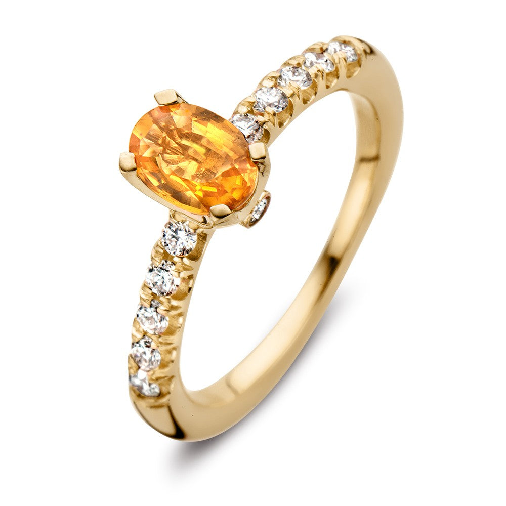 Anillo de oro amarillo de 18K con un ópalo naranja y diamantes de 0.54 crt.