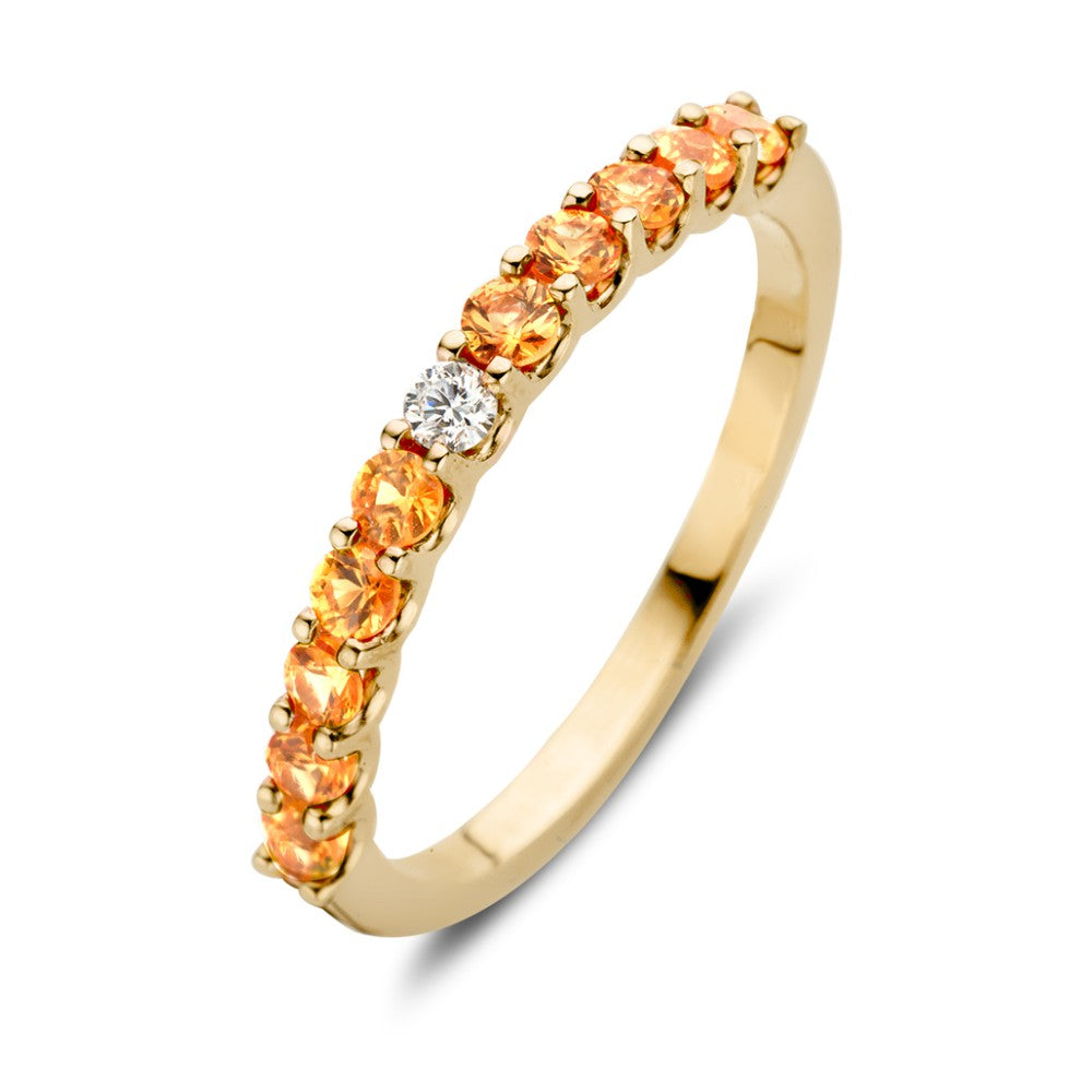 Anillo de oro amarillo de 18 quilates con zafiros naranjas y un brillante blanco.