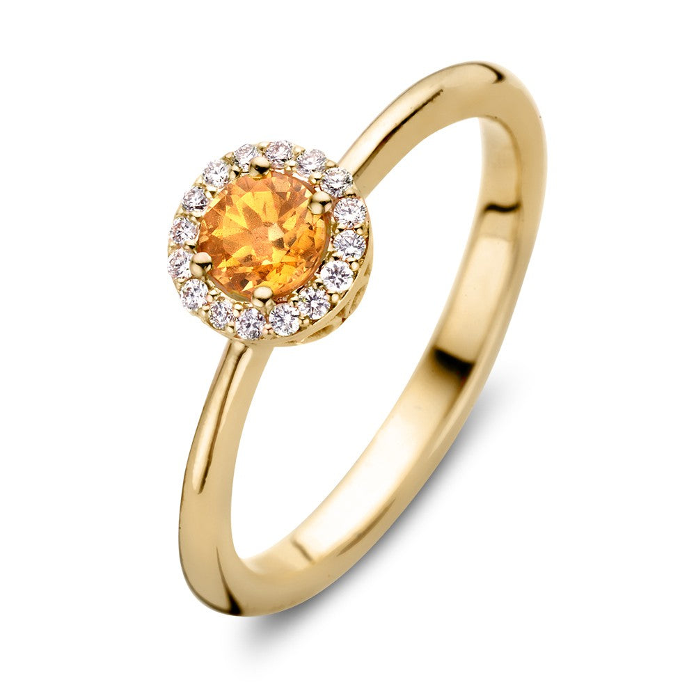 Anillo de oro amarillo de 18 quilates con zafiro naranja y diamantes de 0.11 ct.